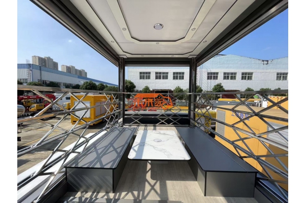 重汽豪沃升降顶侧拓展式多功能房车（二楼升顶平台）